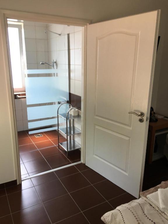 Postel nebo postele na pokoji v ubytování Bor-Vendégház