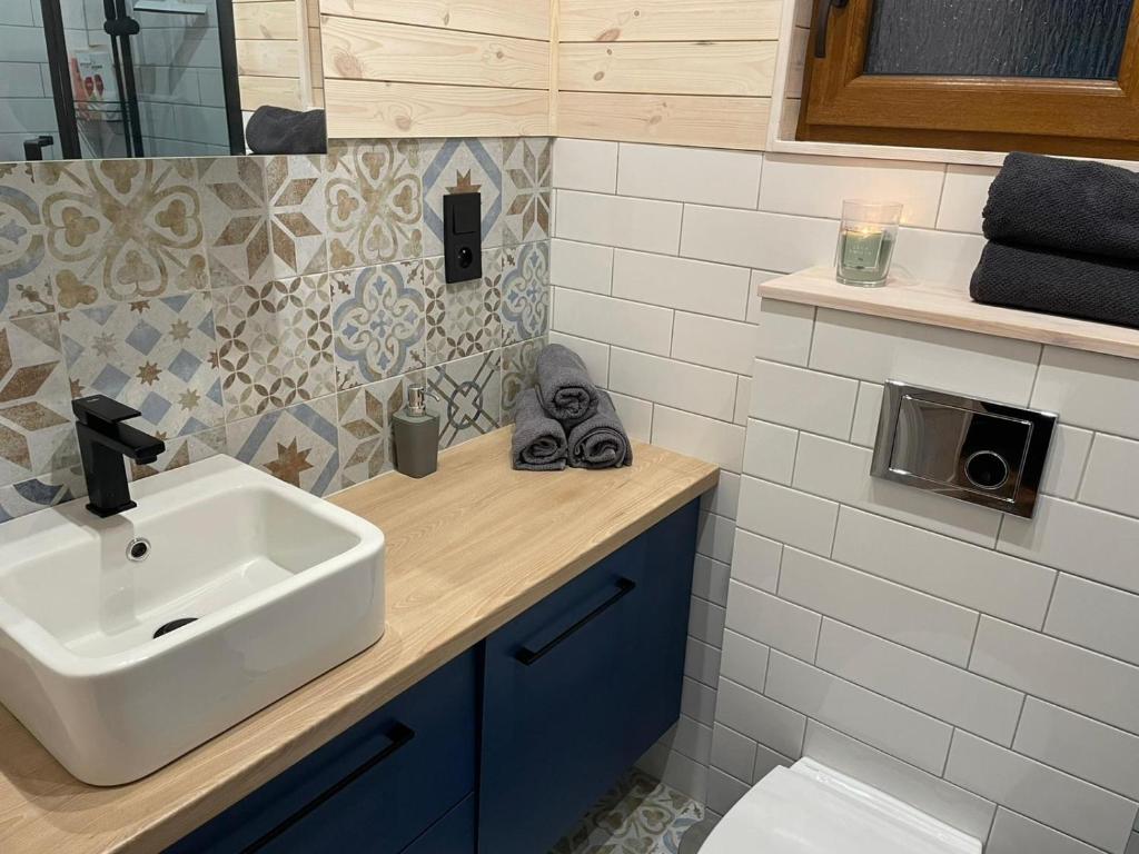 Kúpeľňa v ubytovaní Oslo N°29 Domek Letniskowy