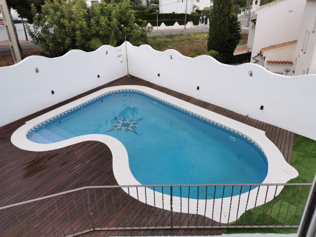 Vista de la piscina de Villa Playa y Montaña o d'una piscina que hi ha a prop