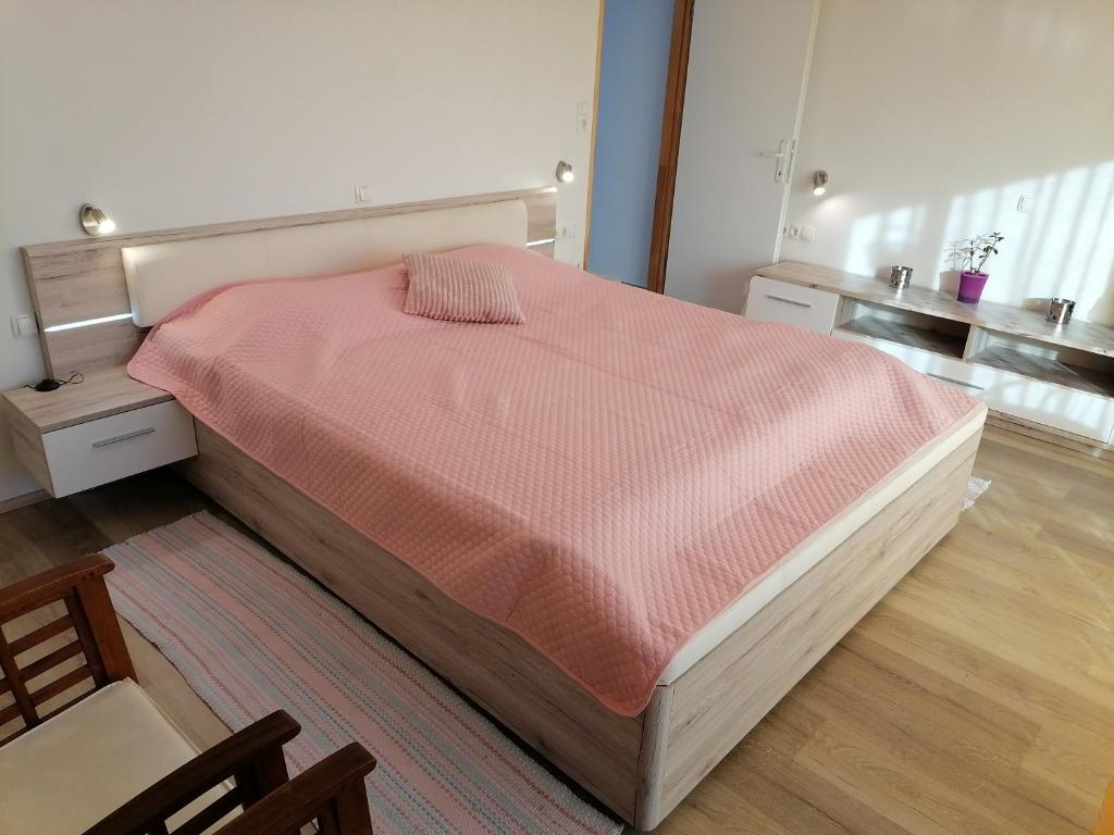 Postel nebo postele na pokoji v ubytování KIKA