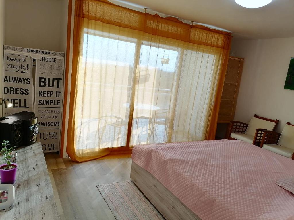 Postel nebo postele na pokoji v ubytování KIKA