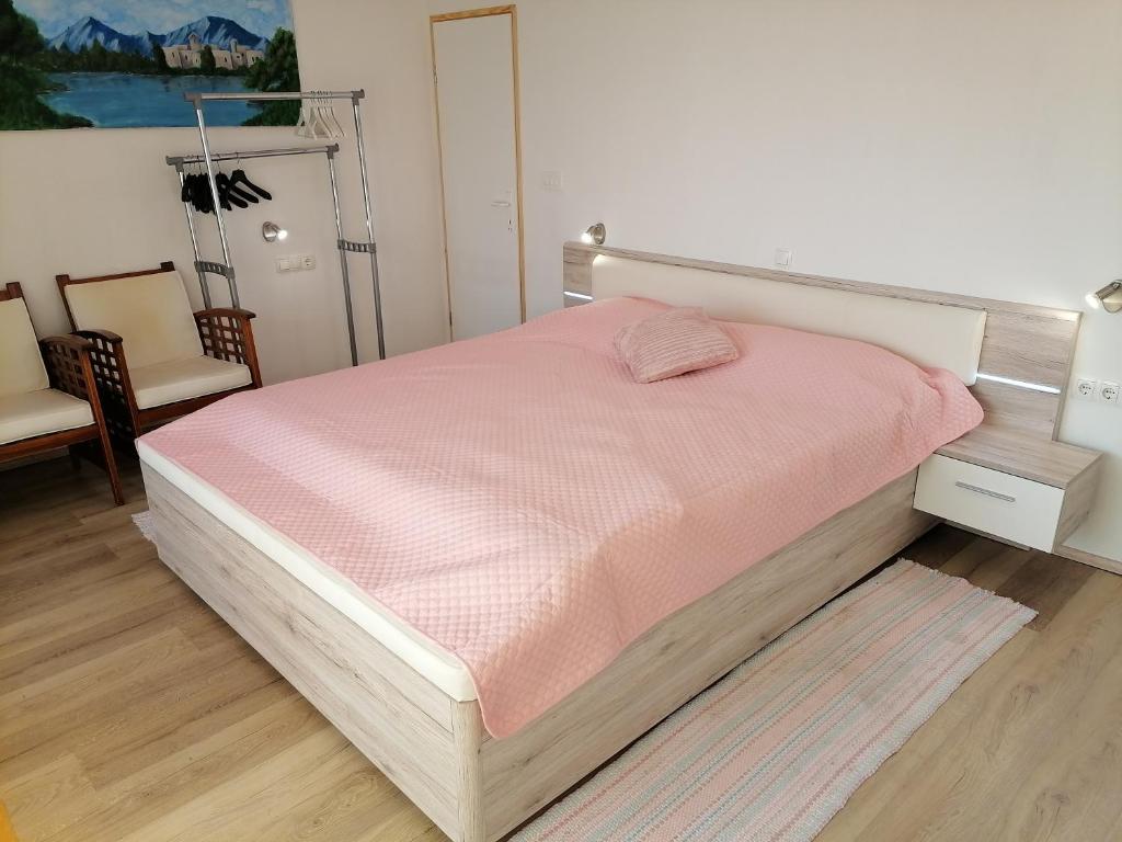 Postel nebo postele na pokoji v ubytování KIKA