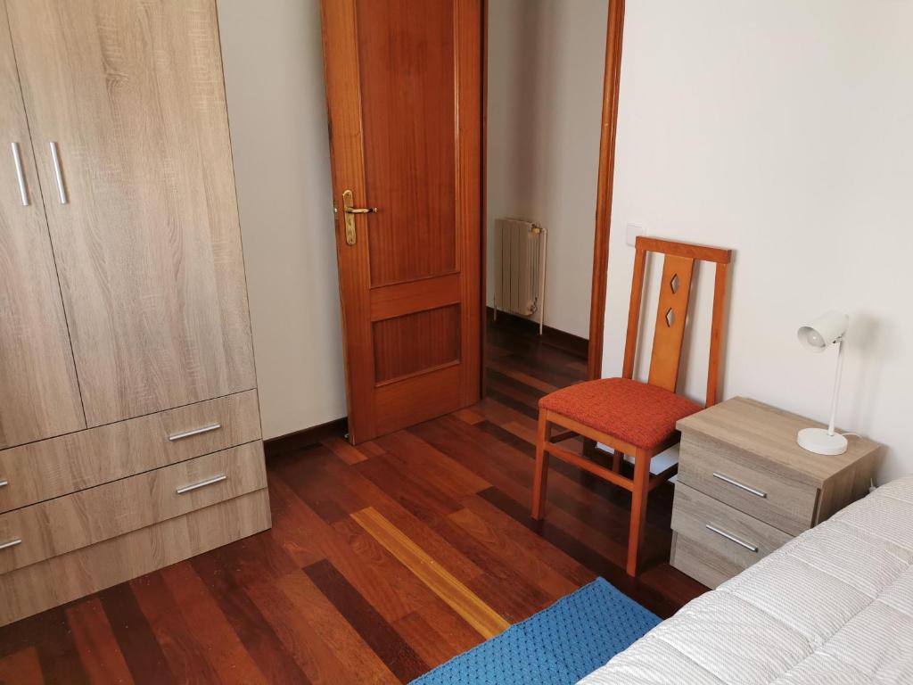 Postel nebo postele na pokoji v ubytování Villa Playa y Montaña