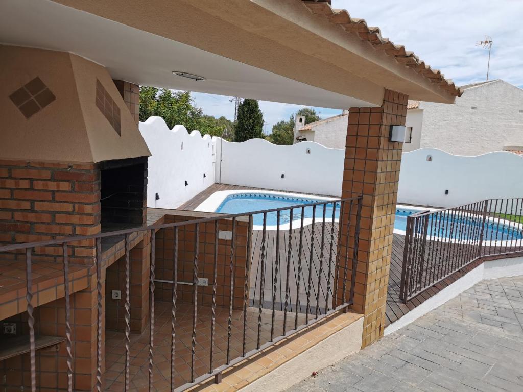 Bazén v ubytování Villa Playa y Montaña nebo v jeho okolí