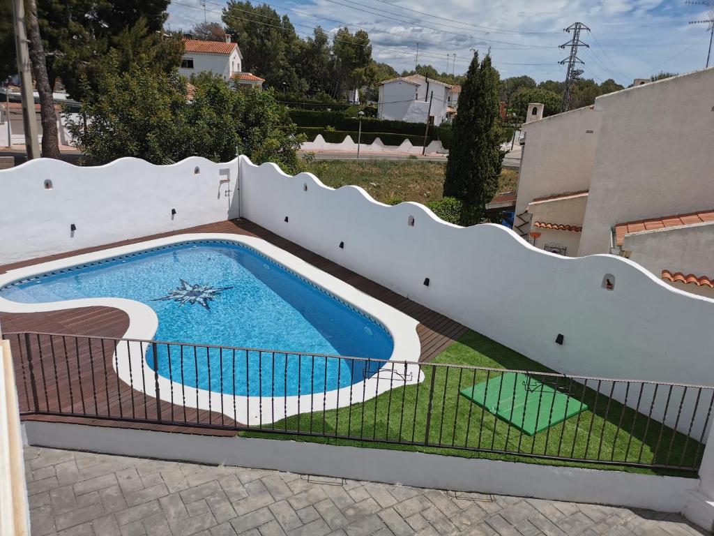 Bazén v ubytování Villa Playa y Montaña nebo v jeho okolí