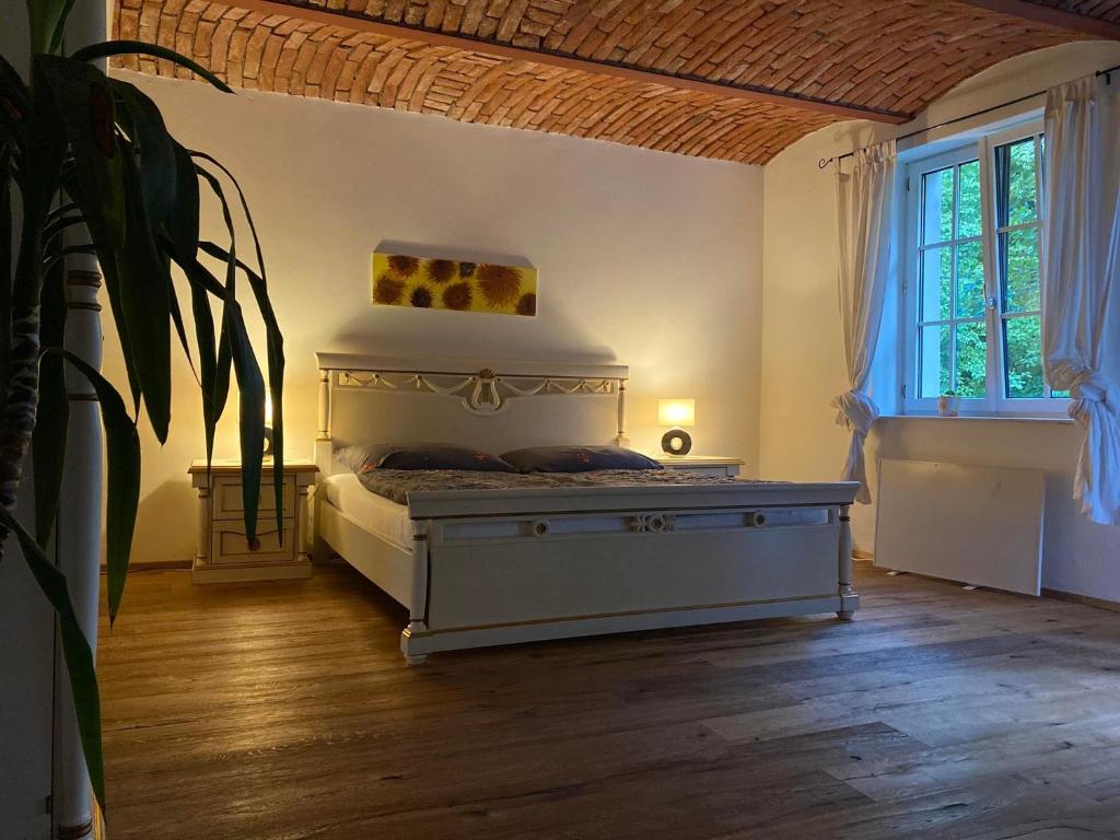 Ένα ή περισσότερα κρεβάτια σε δωμάτιο στο Auern Apartement