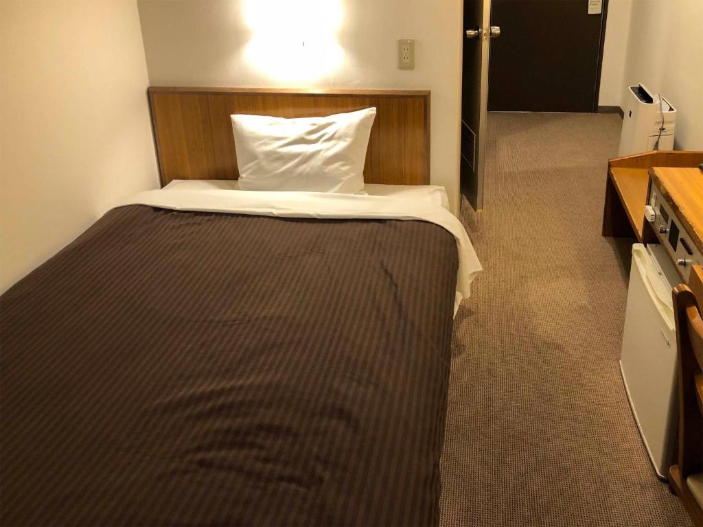 Krevet ili kreveti u jedinici u objektu City Hotel Air Port in Prince - Vacation STAY 80285v