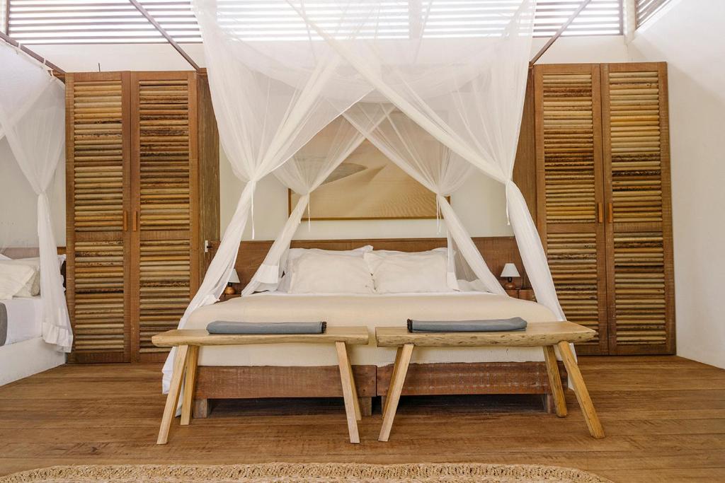 Voodi või voodid majutusasutuse Limbo Atins Chalets - Lençóis Maranhenses toas