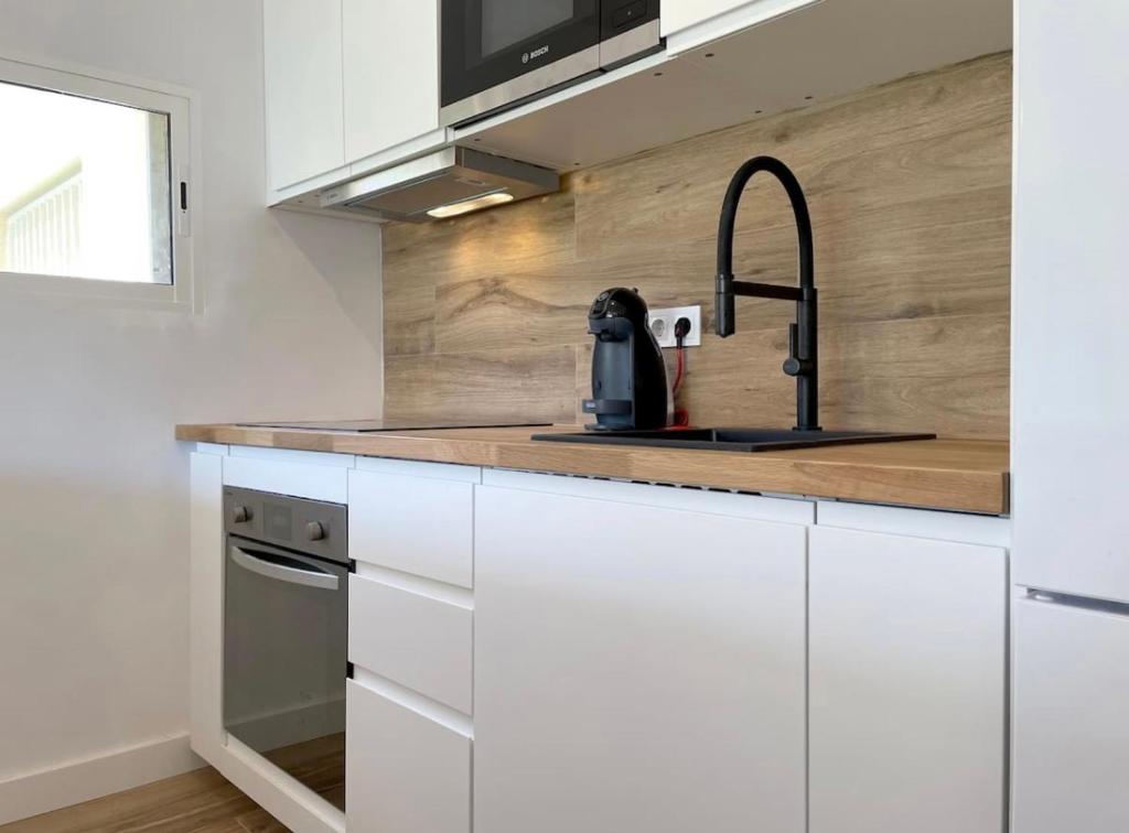 Kuchyň nebo kuchyňský kout v ubytování Precioso apartamento recién reformado