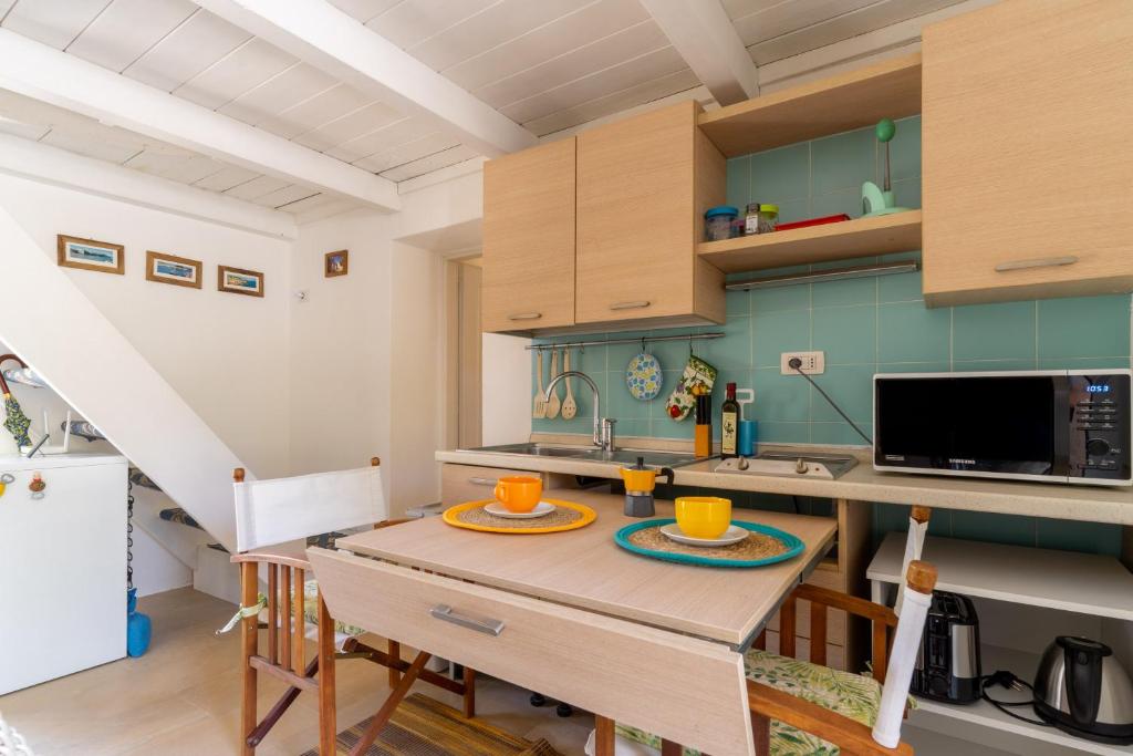 A kitchen or kitchenette at La Pajara de la Urpe