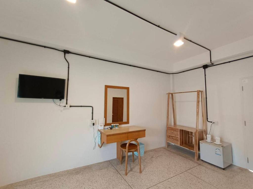 TV a/nebo společenská místnost v ubytování Bangsaphan Resort