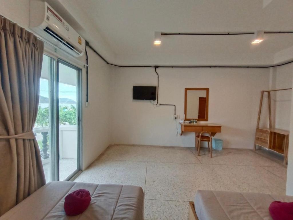 TV a/nebo společenská místnost v ubytování Bangsaphan Resort