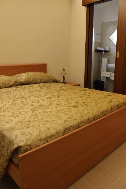 Postel nebo postele na pokoji v ubytování B&B La Volta