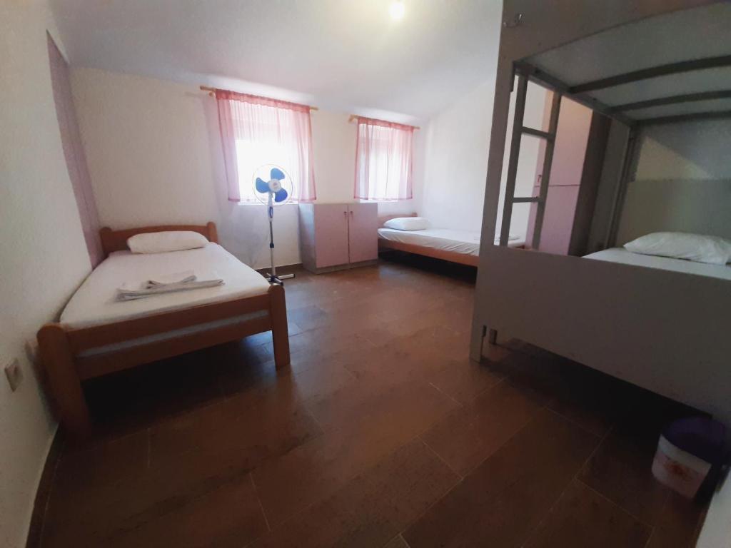 Postel nebo postele na pokoji v ubytování Hostel Hangout