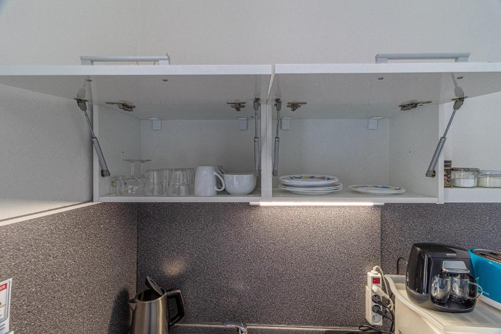 A kitchen or kitchenette at Bratislava -apartment near the City center with a balcony
