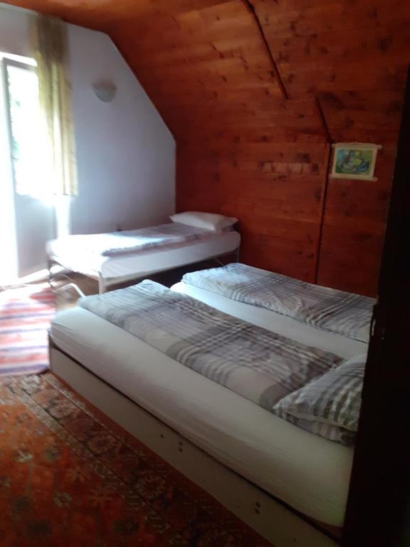 Letto o letti in una camera di Cabana Valea Stanciului