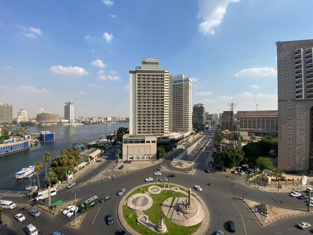 a view of a city with a river and buildings at (AB By The River) 2BR 901 With Great View in Cairo