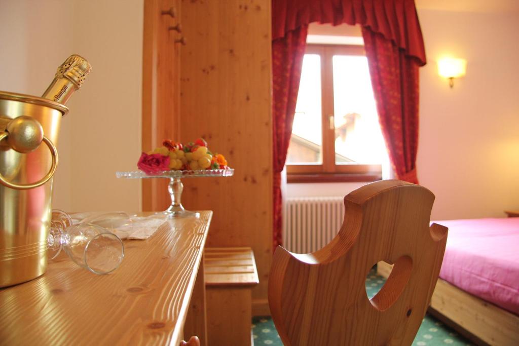Postel nebo postele na pokoji v ubytování Hotel Lory