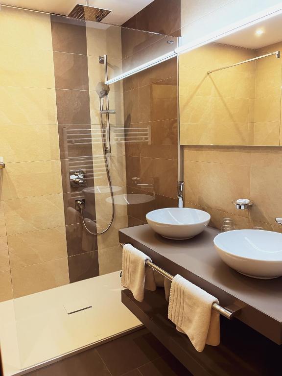Koupelna v ubytování Hotel Kärnten