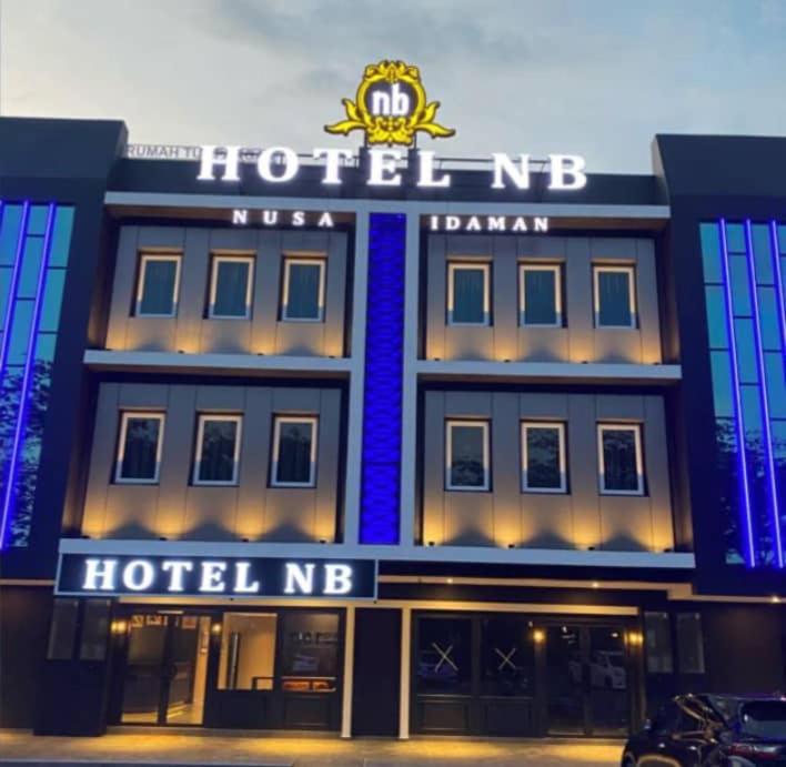 a hotel with a sign on the front of it at NB HOTEL in Johor Bahru