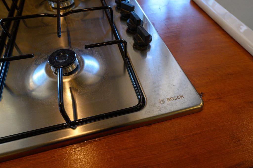 A kitchen or kitchenette at Kalochori Luxury Cottage