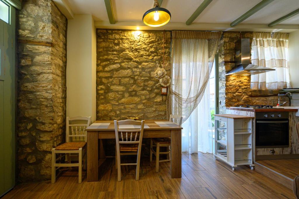A kitchen or kitchenette at Kalochori Luxury Cottage