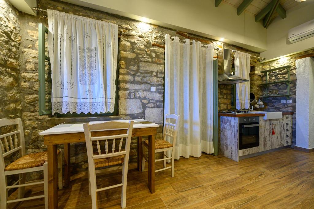 A kitchen or kitchenette at Kalochori Luxury Cottage