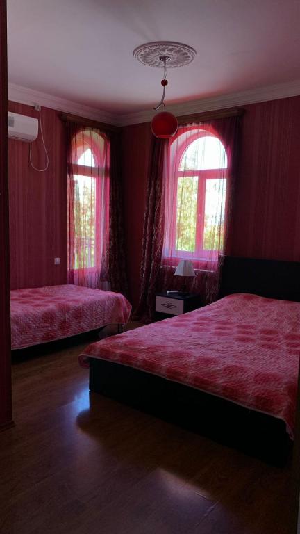 Postel nebo postele na pokoji v ubytování Zandarashvili Guest House