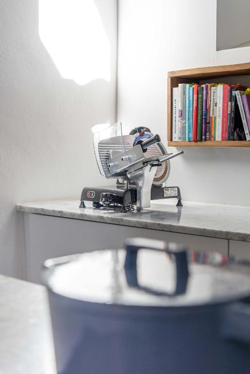 a hair dryer sitting on top of a counter at MAISON de la Bonne Vie in Thérondels