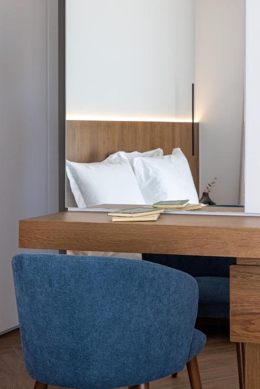A bed or beds in a room at Neoma