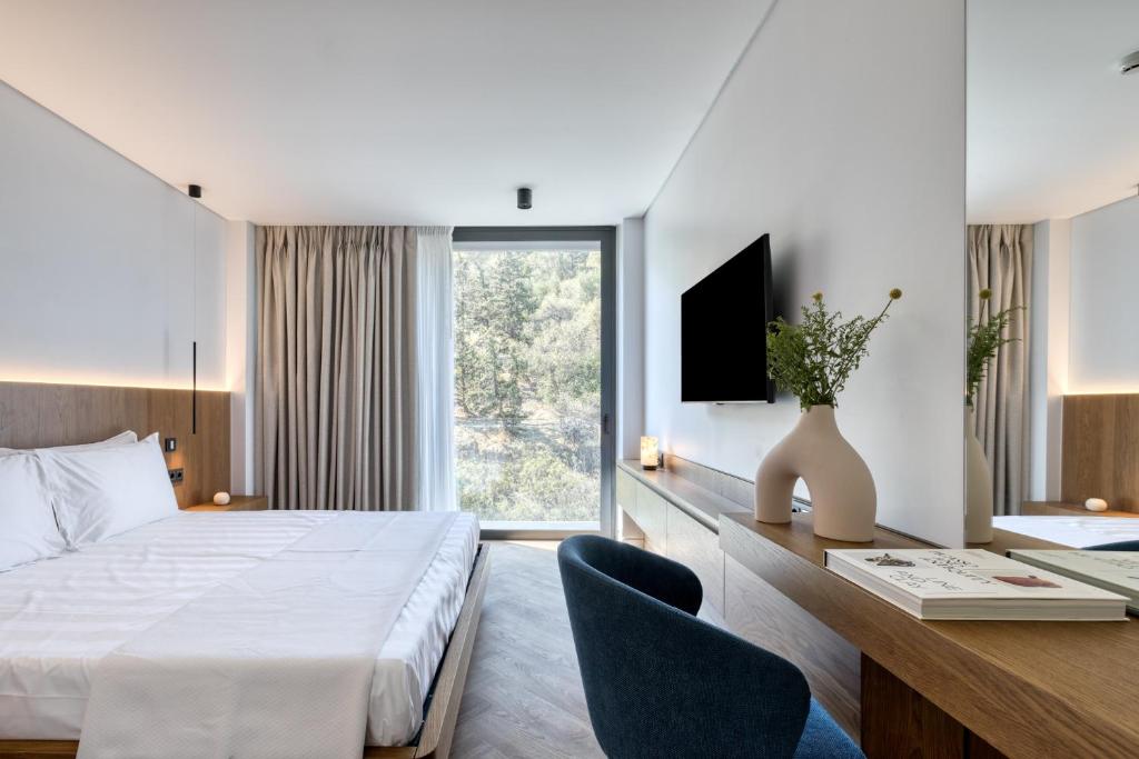 A bed or beds in a room at Neoma