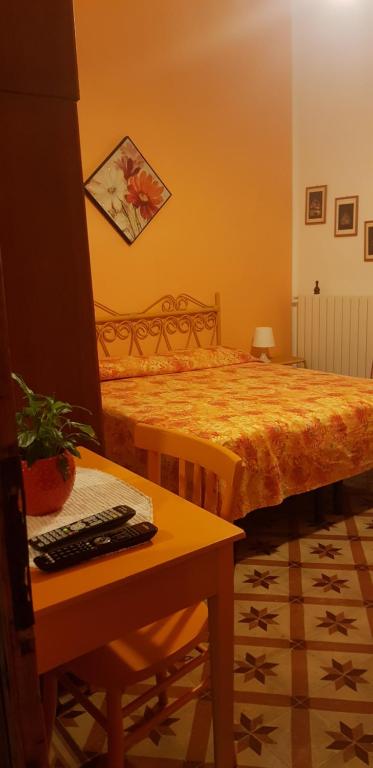 Postel nebo postele na pokoji v ubytování Albergo Pensione Bartoli