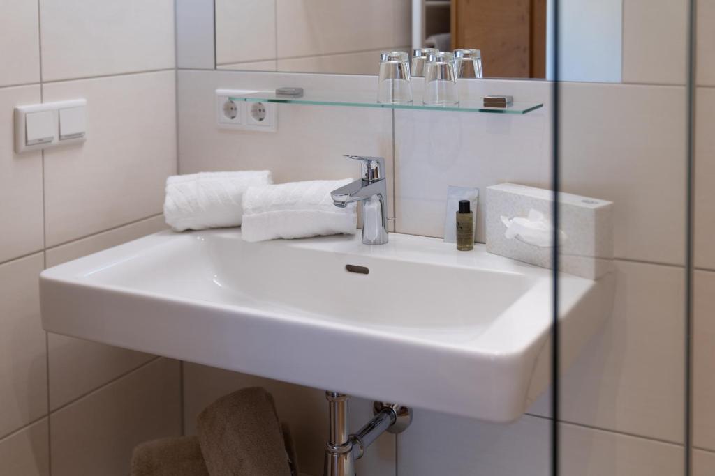 Koupelna v ubytování Hotel Die Metzgerstubn