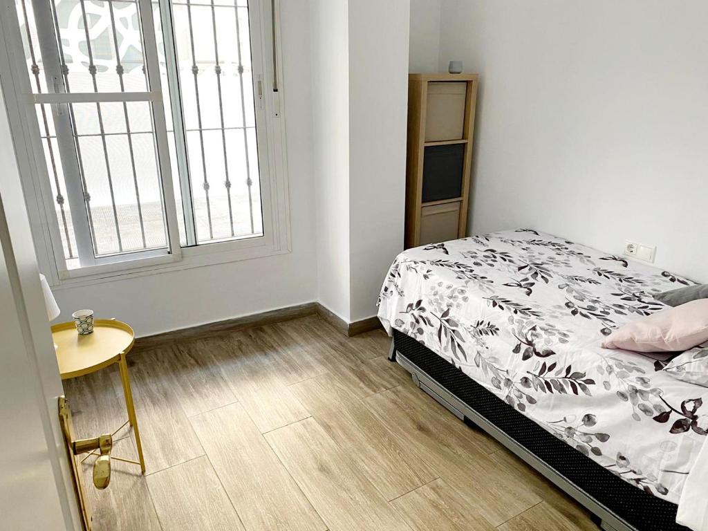 Posteľ alebo postele v izbe v ubytovaní Beachfront two-bedroom apartment in Fuengirola