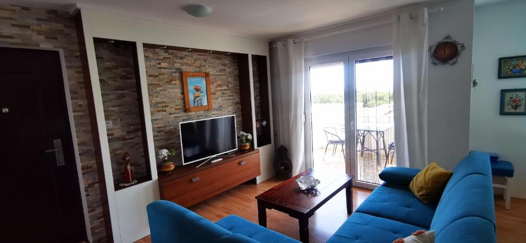 Telewizja i/lub zestaw kina domowego w obiekcie Bellavista Medulin Sea View