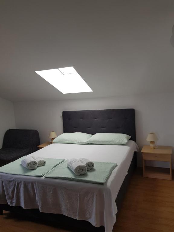 Postel nebo postele na pokoji v ubytování Apartments Damić