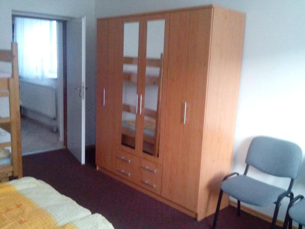 Postel nebo postele na pokoji v ubytování Ubytování v Mladých Bukách