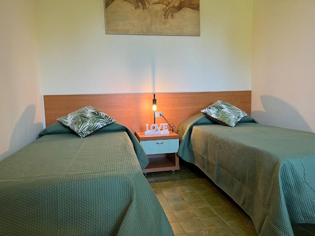 Ένα ή περισσότερα κρεβάτια σε δωμάτιο στο Sunflower apartament