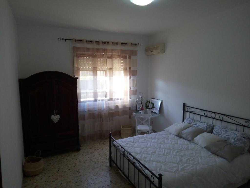 Postel nebo postele na pokoji v ubytování B&B Lilium Otranto