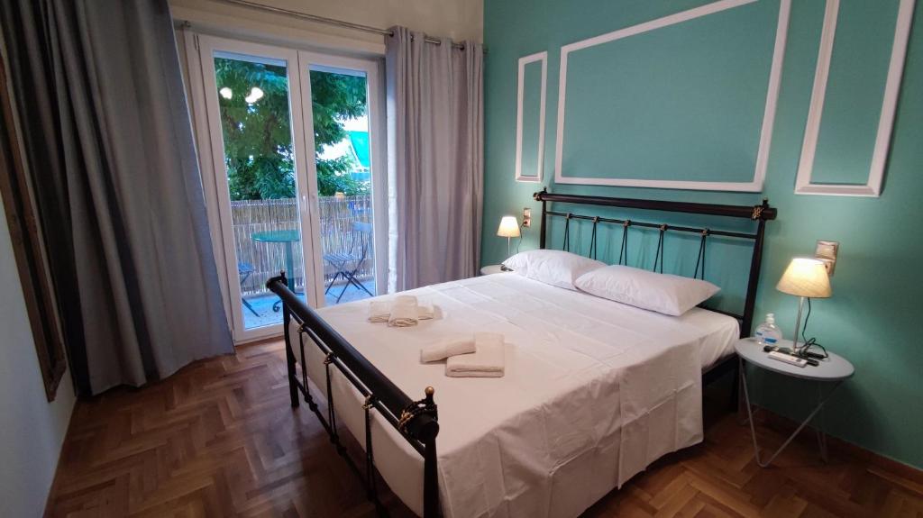 Posteľ alebo postele v izbe v ubytovaní Victoria Boutique Studios