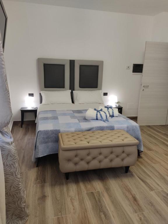 Postel nebo postele na pokoji v ubytování B&B Capovento Della Murgia