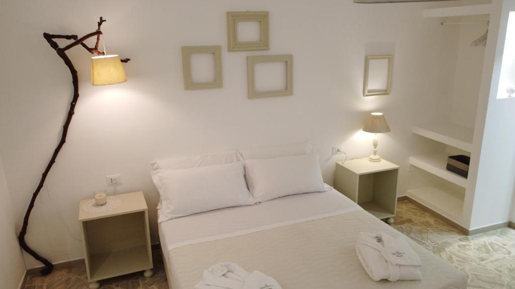 Postel nebo postele na pokoji v ubytování Dimora TerraNostra&Spa