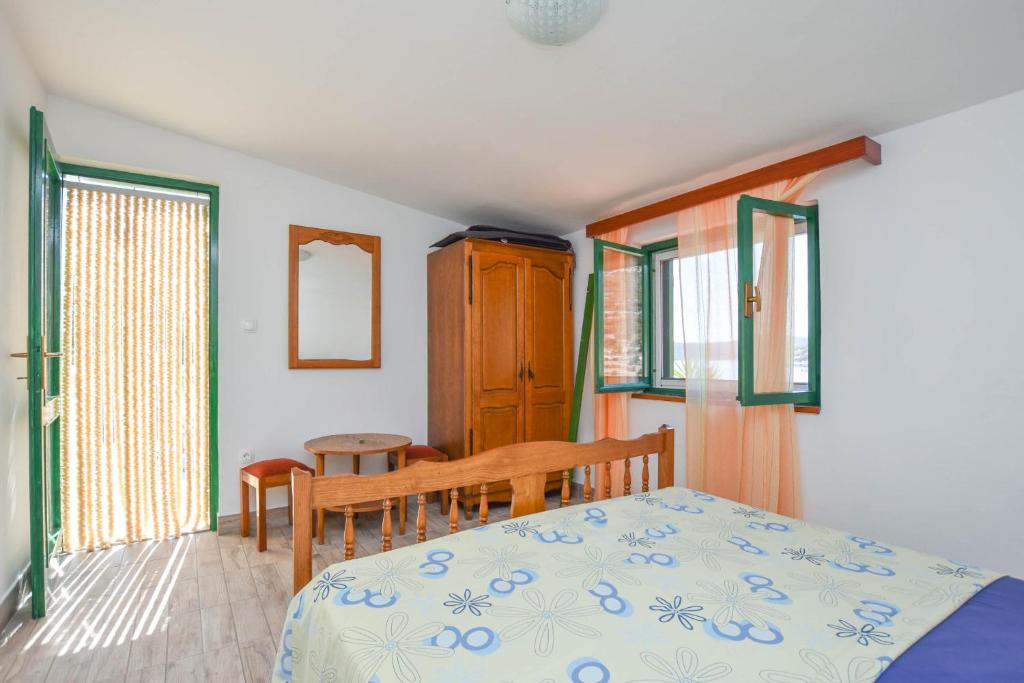 Postel nebo postele na pokoji v ubytování House Vesela