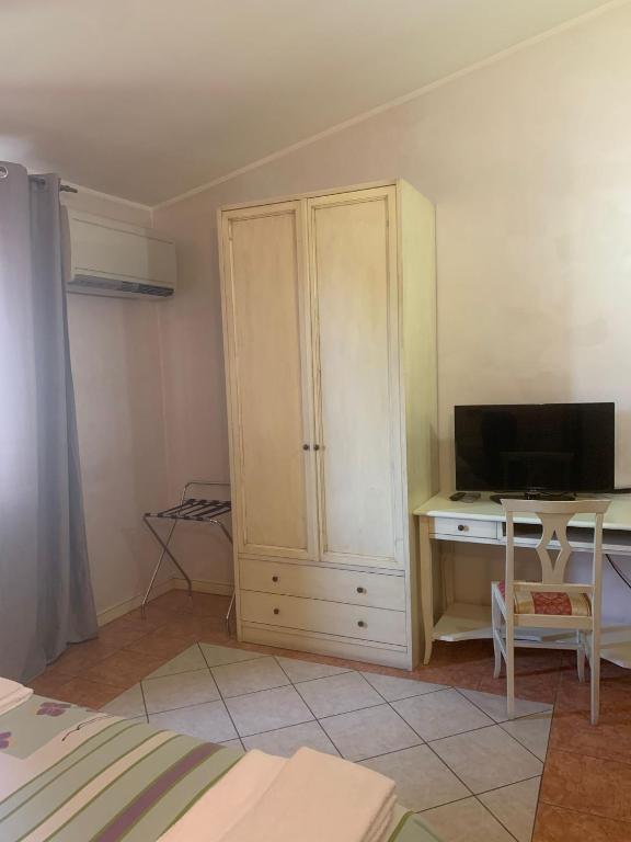 TV a/nebo společenská místnost v ubytování Hotel Due Colonne
