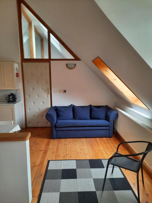 Posezení v ubytování Mon-Csa Studio Apartman