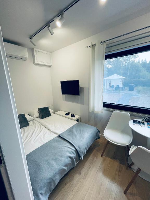 Posteľ alebo postele v izbe v ubytovaní Beds Friends Apartments