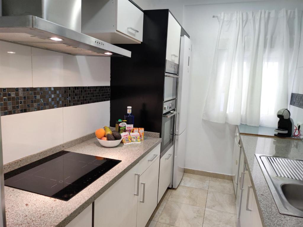 Kuchyň nebo kuchyňský kout v ubytování La Brisa apartamento