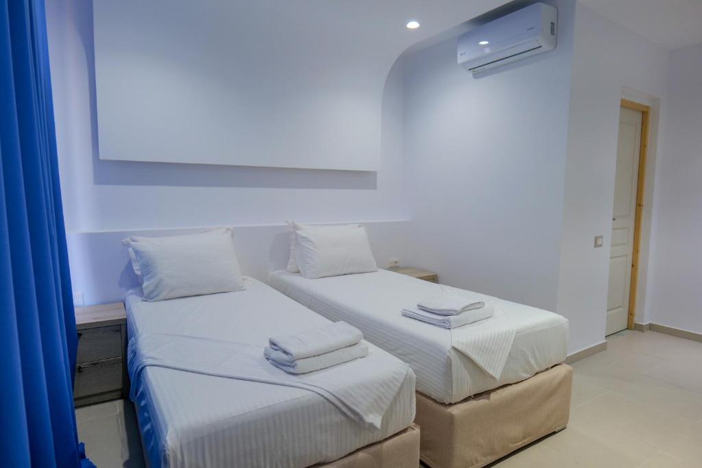 Postel nebo postele na pokoji v ubytování Sea View Hotel
