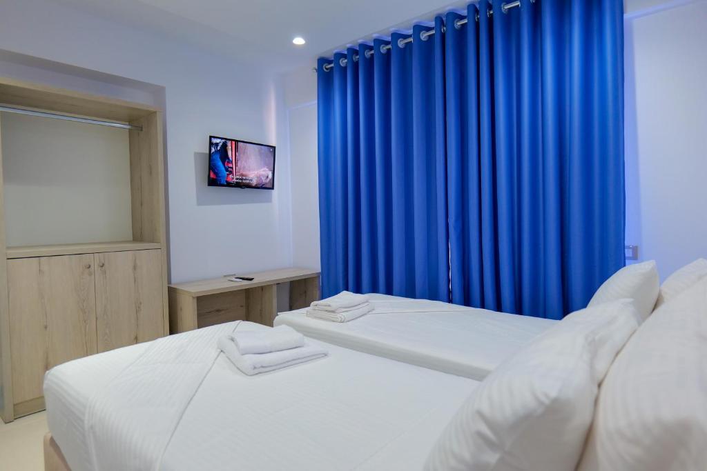 Postel nebo postele na pokoji v ubytování Sea View Hotel