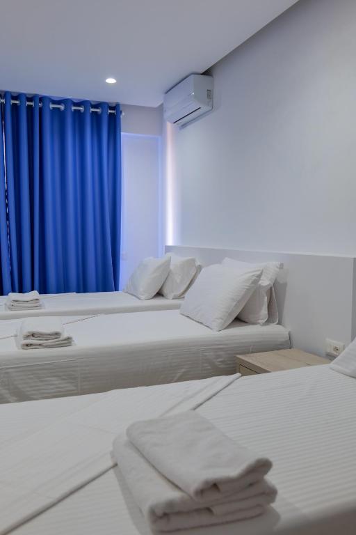 Postel nebo postele na pokoji v ubytování Sea View Hotel